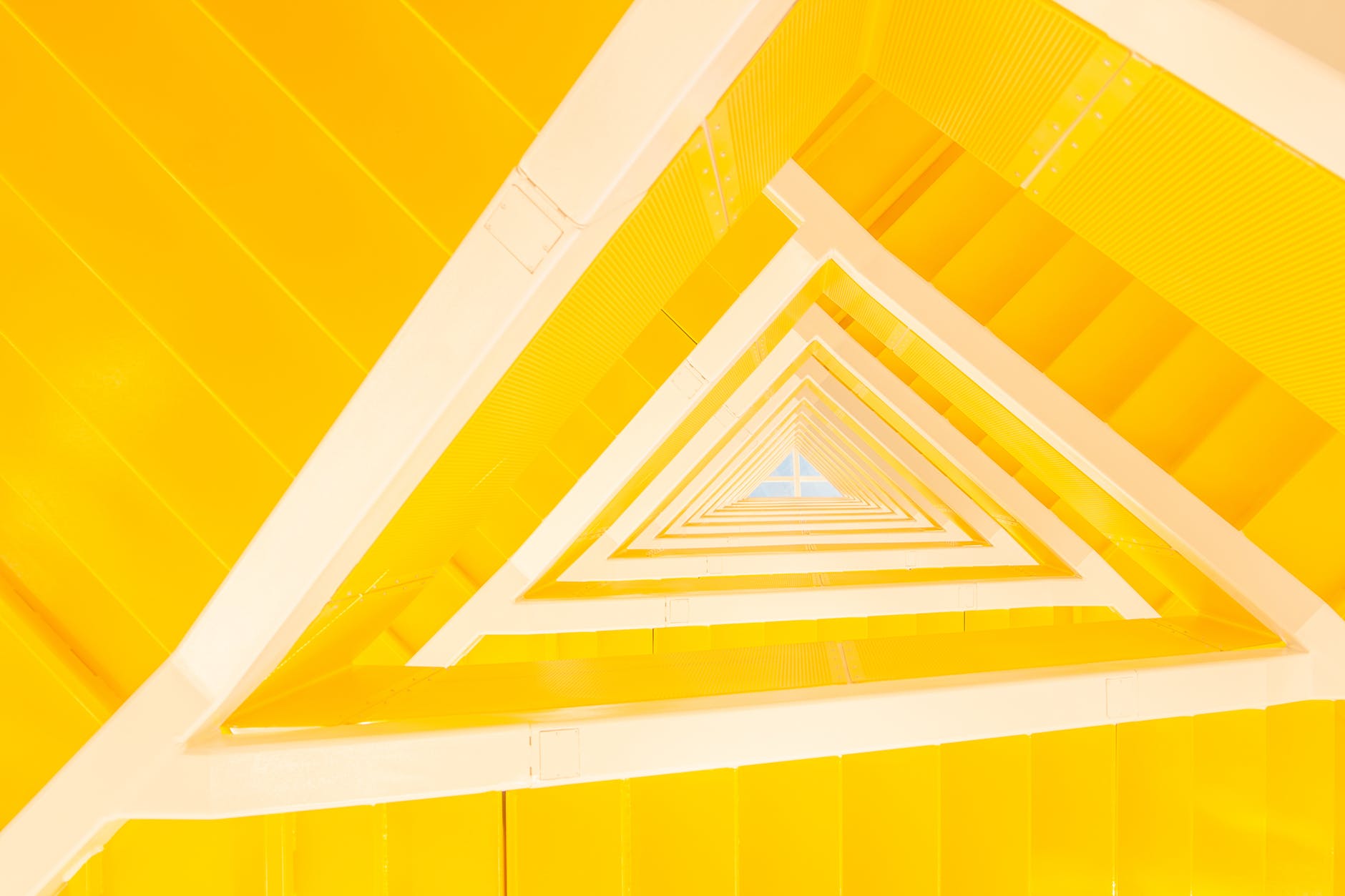 yellow geometric staircase in contemporary apartment